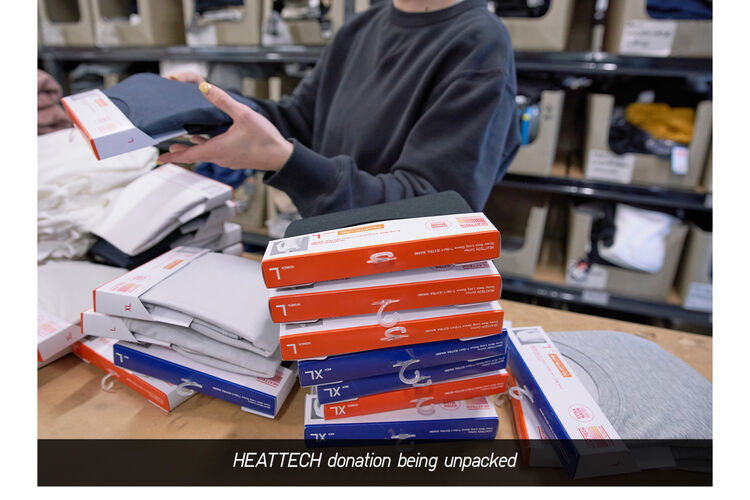 HEATTECH donation being unpacked