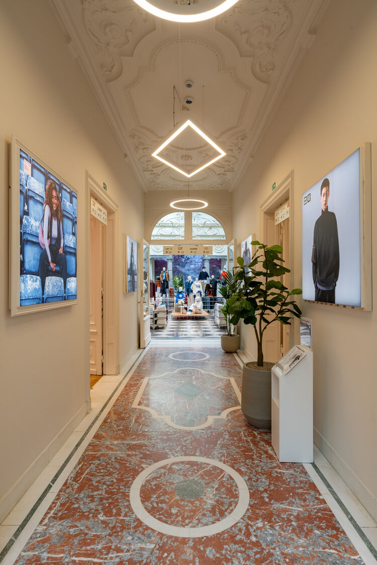 Photo of an aisle inside UNIQLO’s new store in Belgium