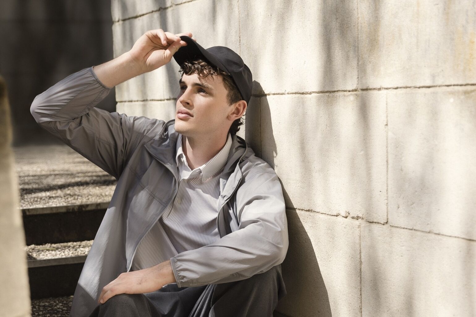 Male model wearing UV protection hooded jacket and a patterned shirt