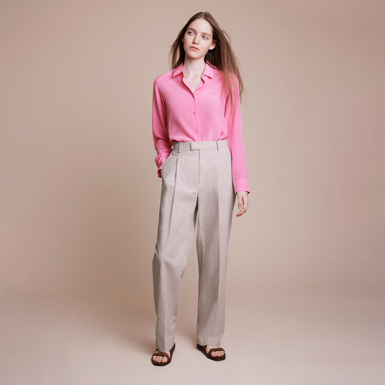 model wearing Ines de la Fressange silk shirt and cotton trousers