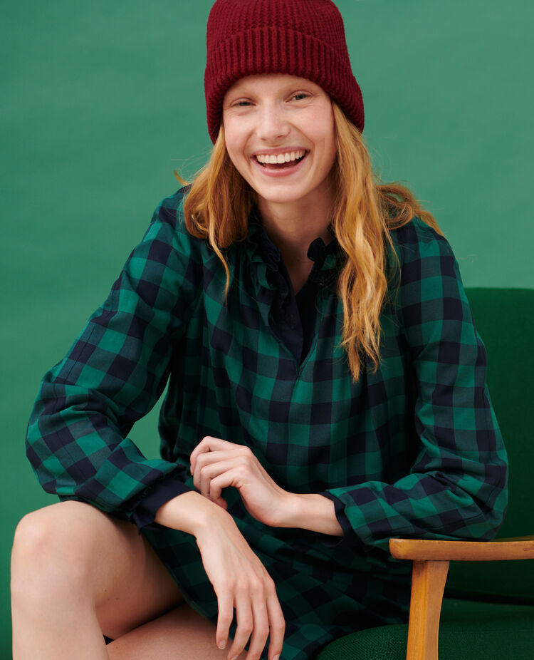 model wearing Comptoir des Cotonniers green checked dress