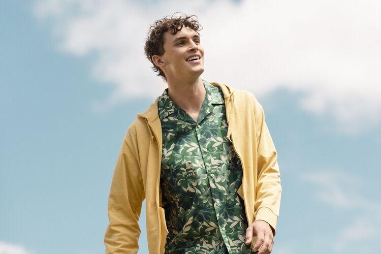 Male model wearing UV protection hooded jacket and a patterned shirt