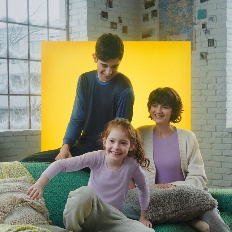 Woman and kids wearing UNIQLO HEATTECH