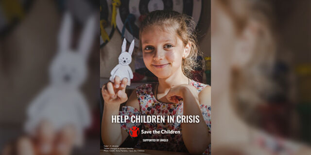 child holding rabbit paper finger puppet