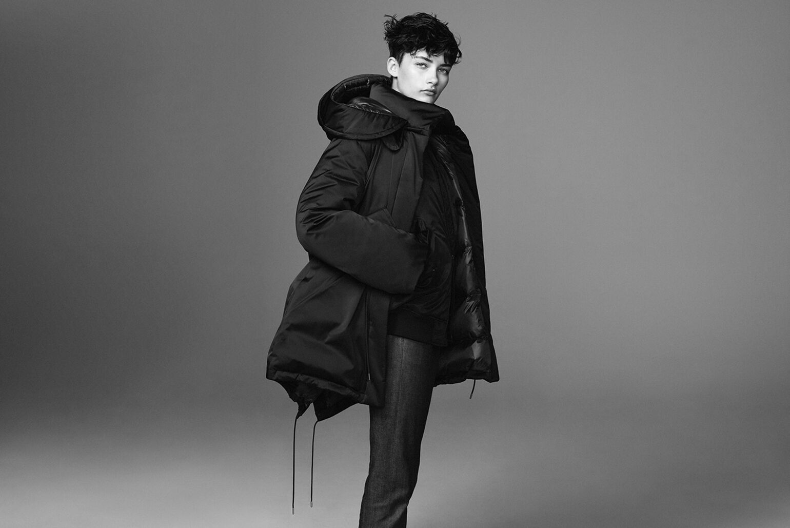 Woman wearing a +J down short coat