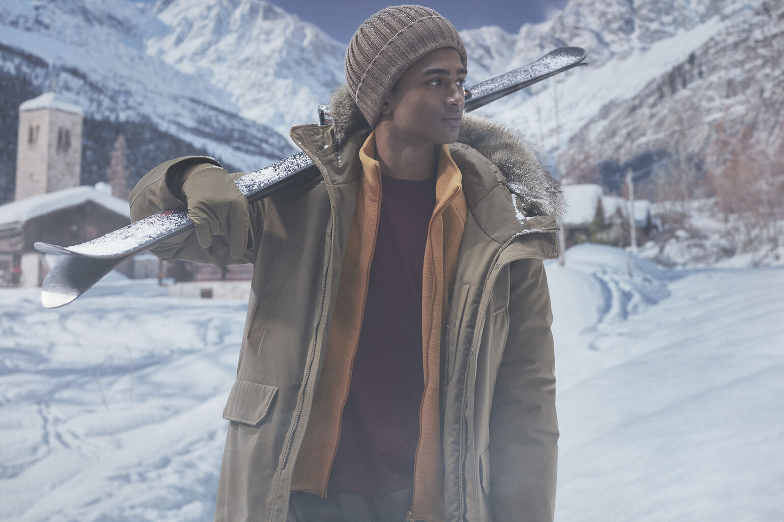 man wearing ultra warm hybrid down