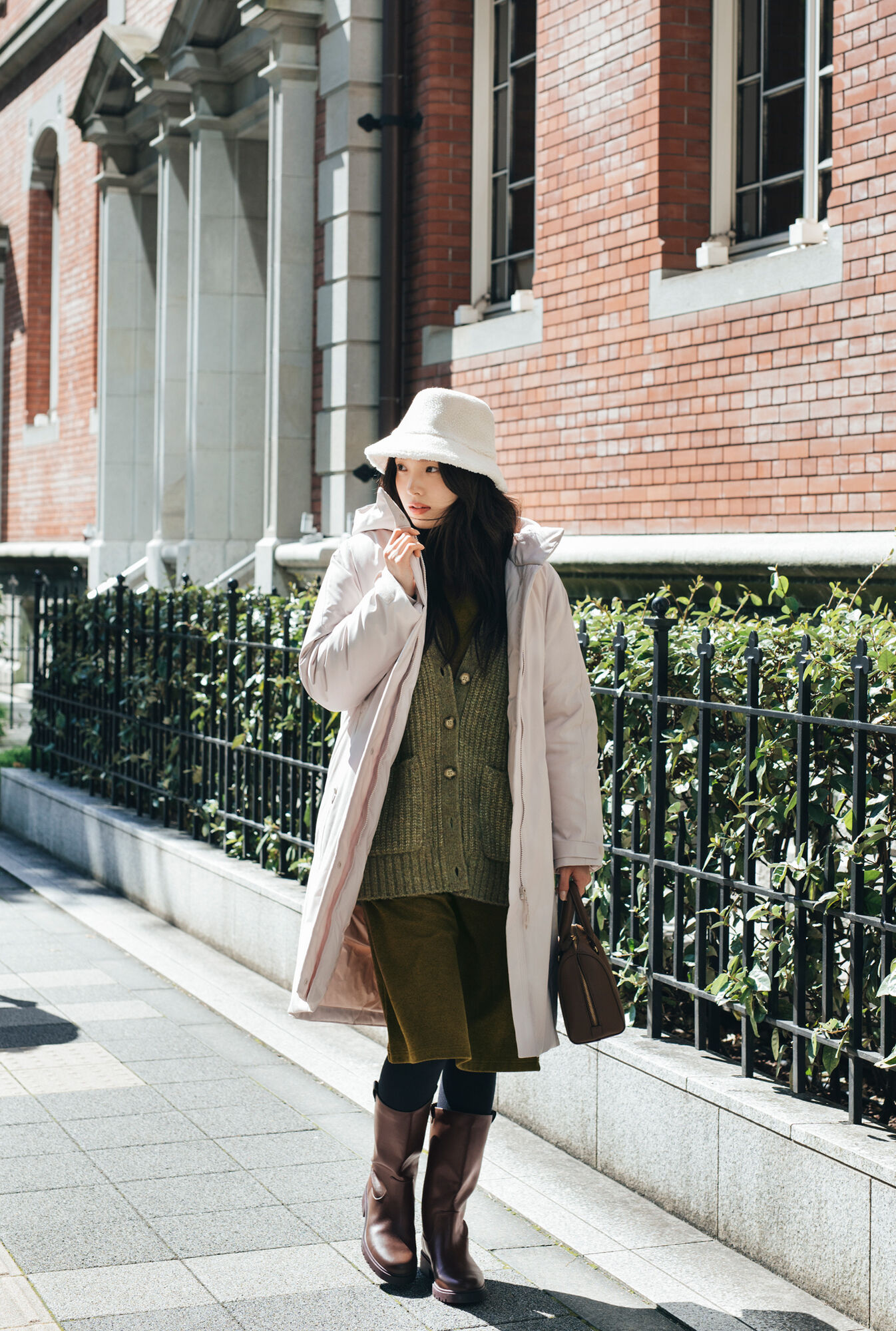 woman wearing ultra warm hybrid down