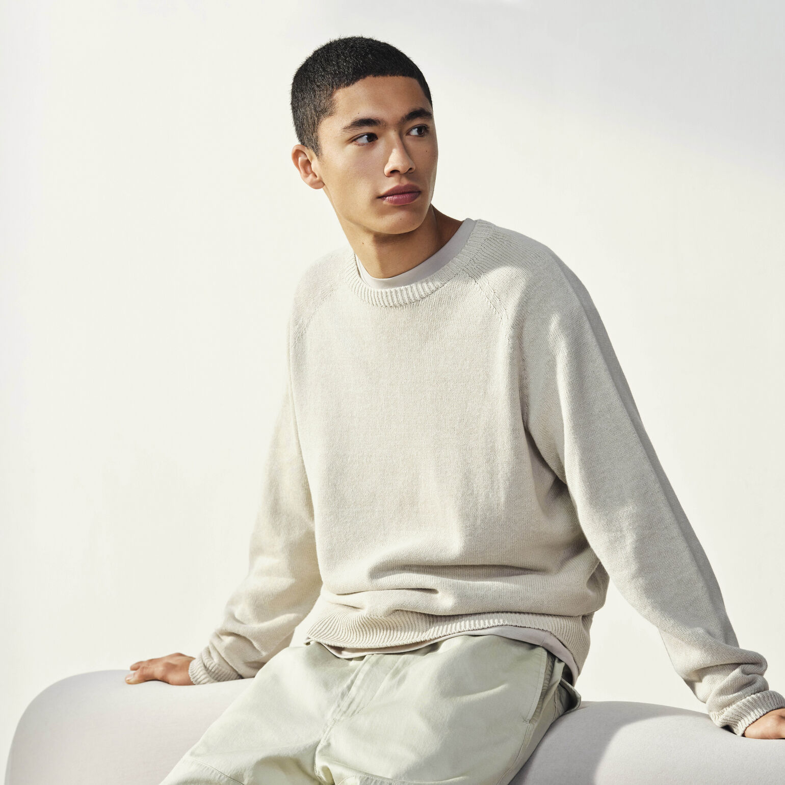 man wearing Uniqlo U jumper
