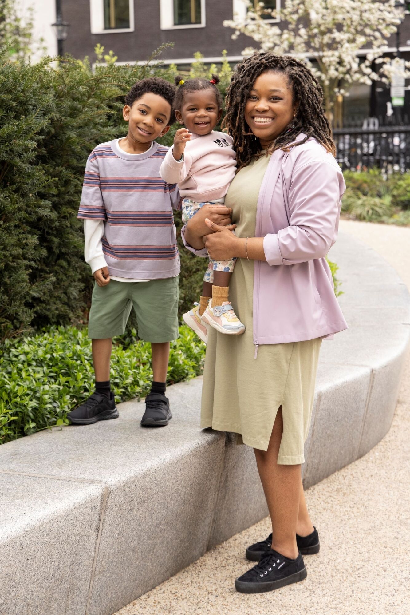 mother with two children wearing UNIQLO