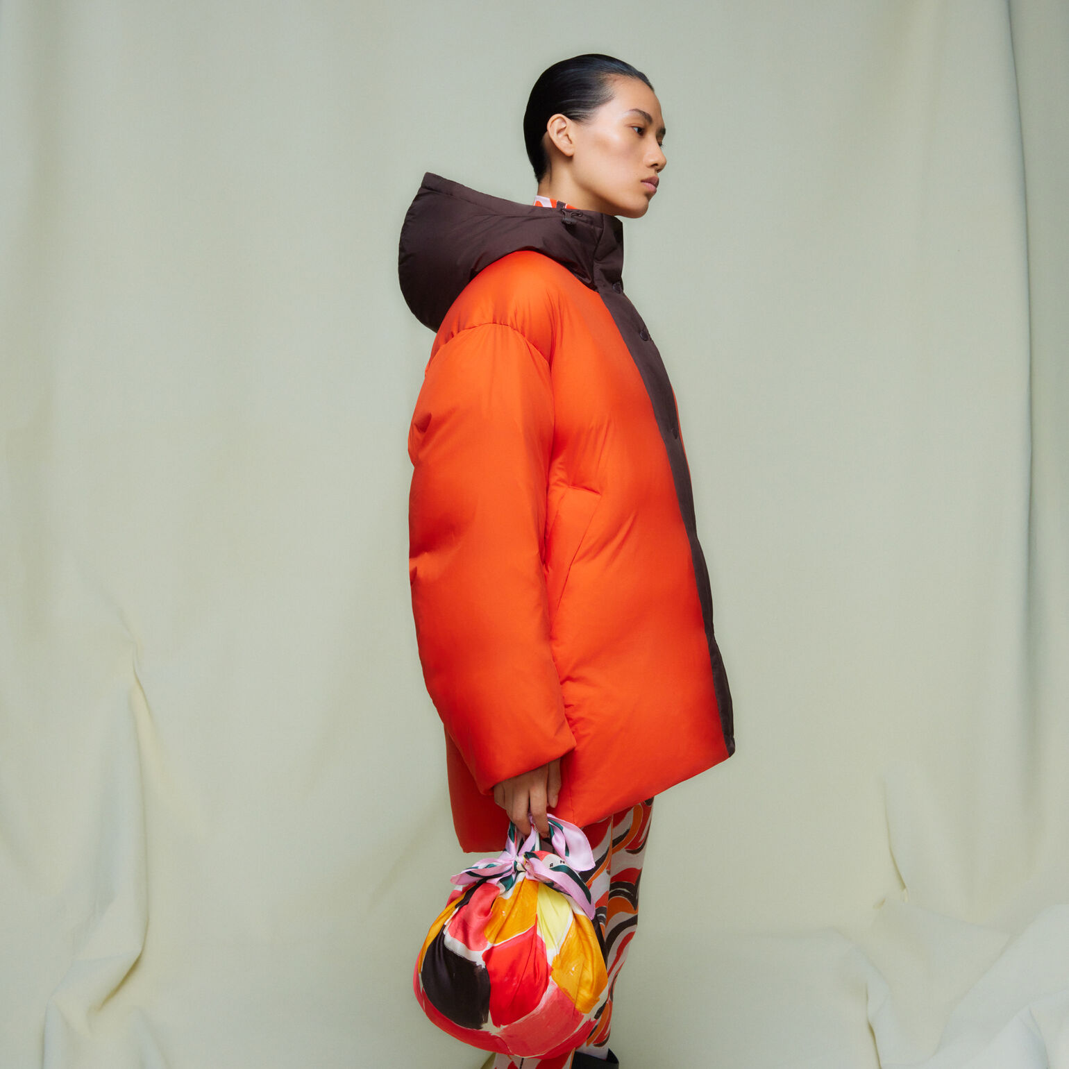 model wearing UNIQLO and MARNI down oversized hooded coat