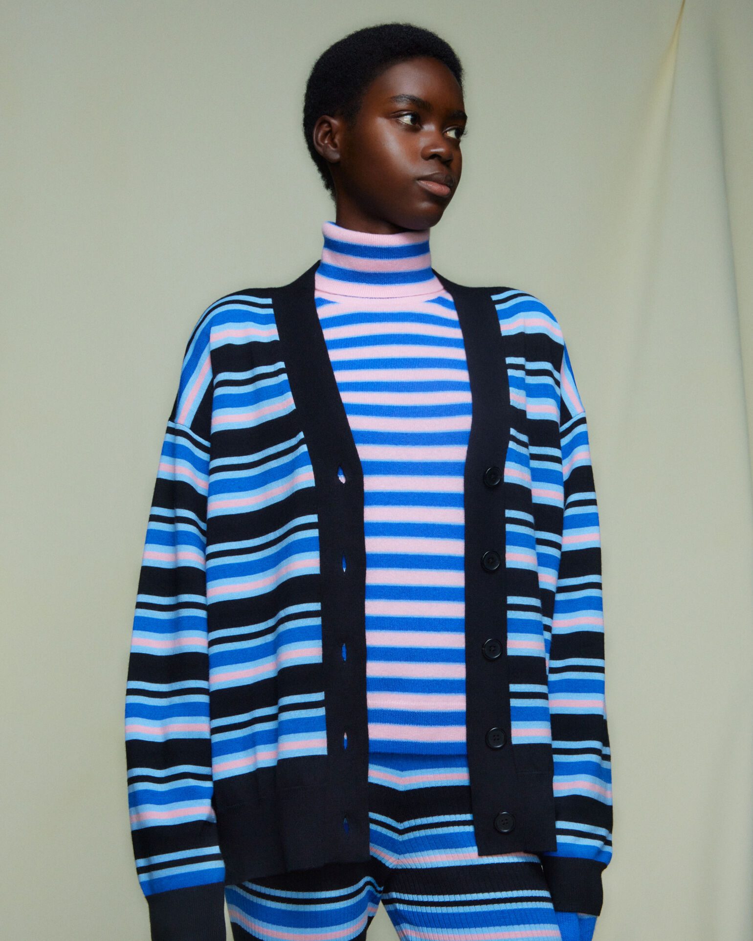 model wearing UNIQLO and MARNI Merino striped oversized cardigan