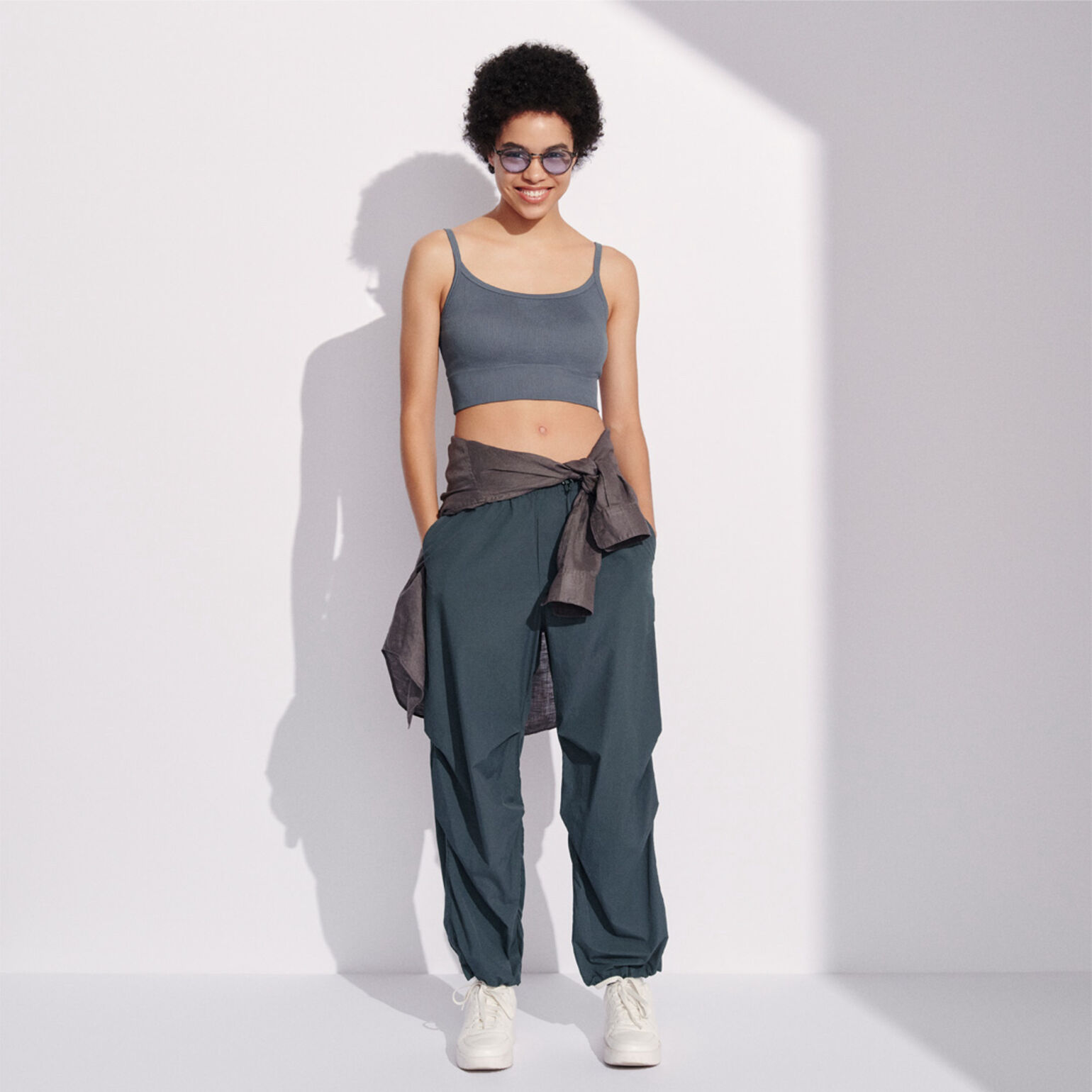 model wearing Seamless Half Camisole Bra Top