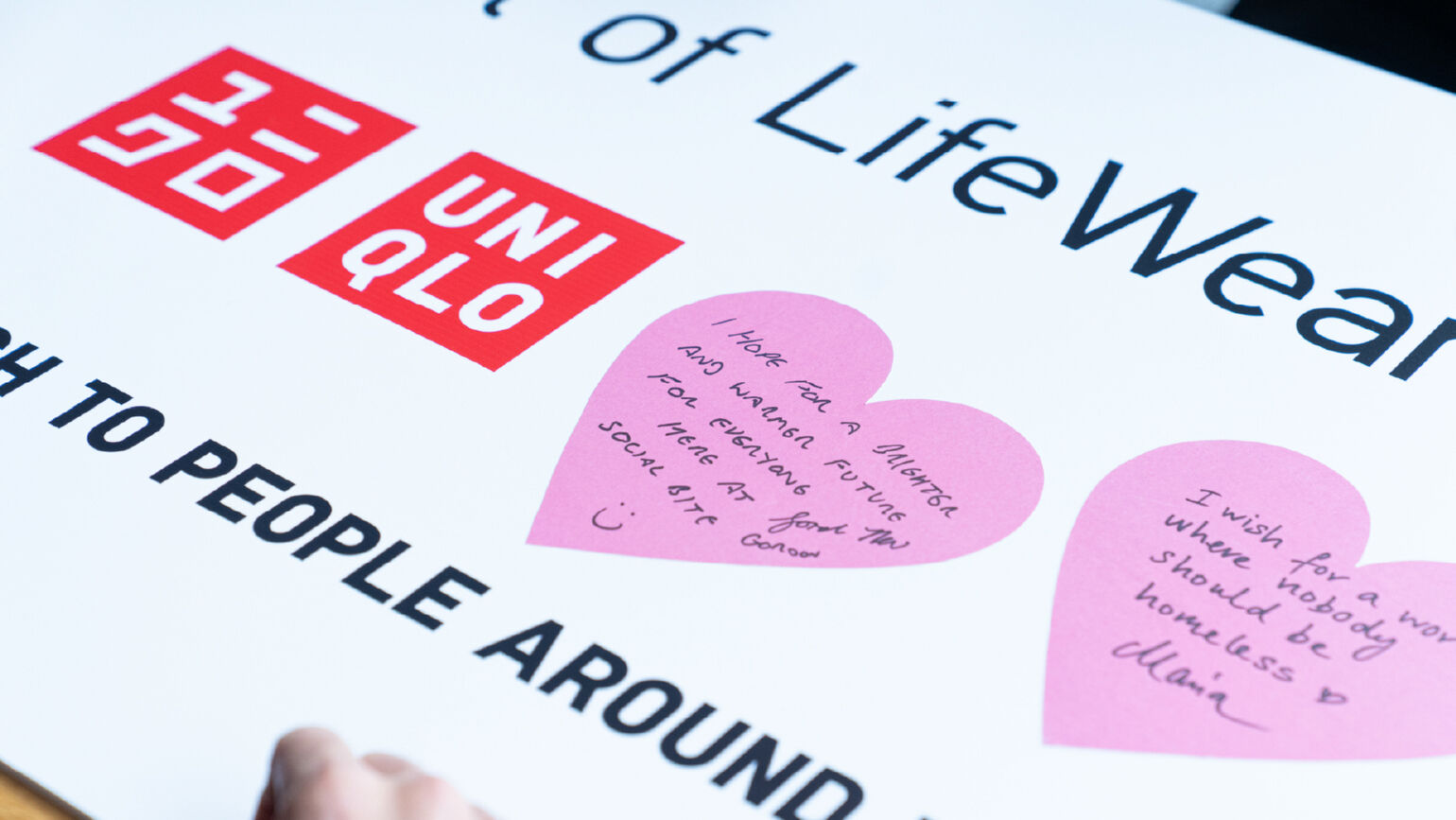 An image of a message written on a heart-shaped sticker.