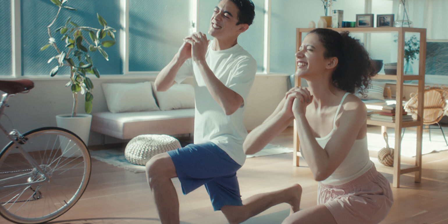 man and woman wearing UNIQLO AIRism shorts