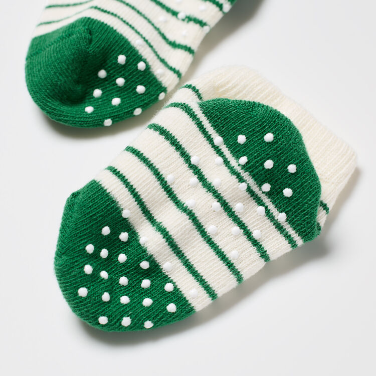 kaos kaki grip