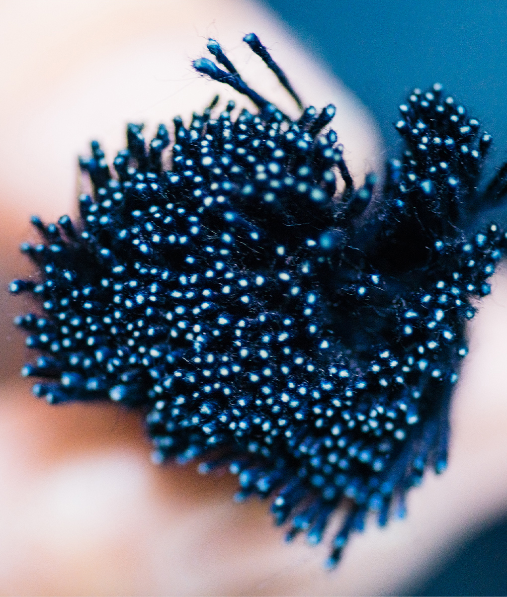 We dye only the outer circumference of the yarn and keep the center core pure white