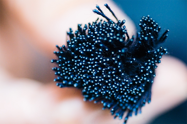 We dye only the outer circumference of the yarn and keep the center core pure white