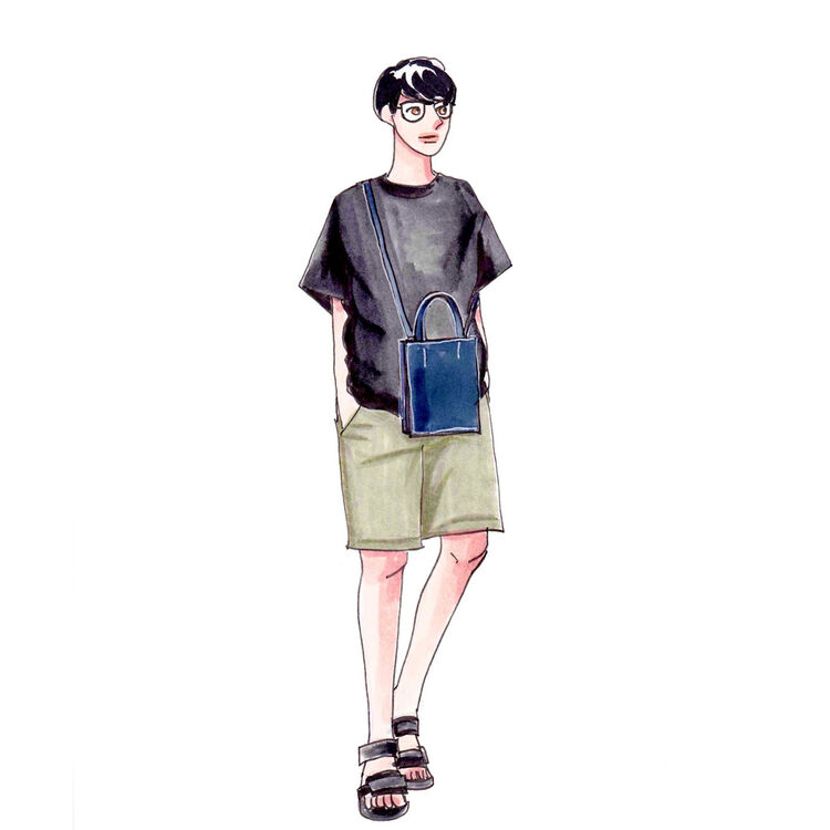 黒のTシャツにカーキのチノパンツを合わせたカジュアルなメンズコーデ