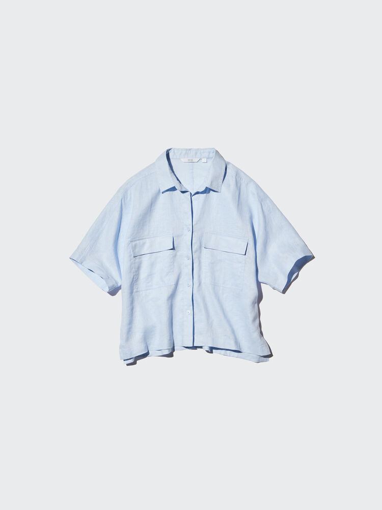 A simple product image of a clean, light blue linen shirt, photographed from the front.