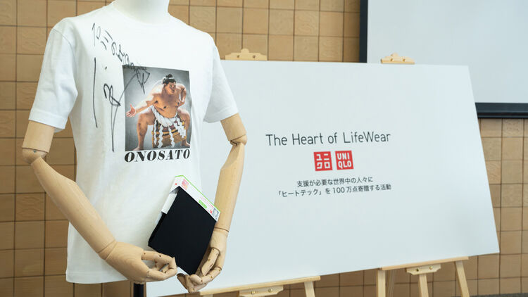 Image of a mannequin wearing a T-shirt with an image of a sumo wrestler
