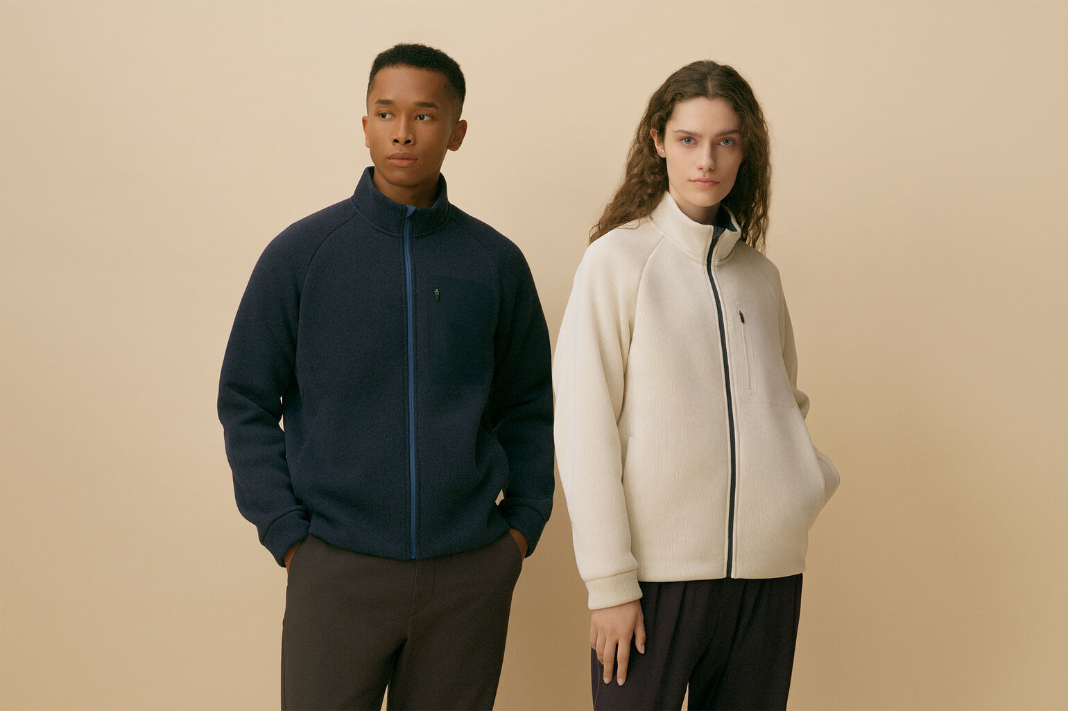 Image of a man and woman wearing a Knit Fleece Jacket