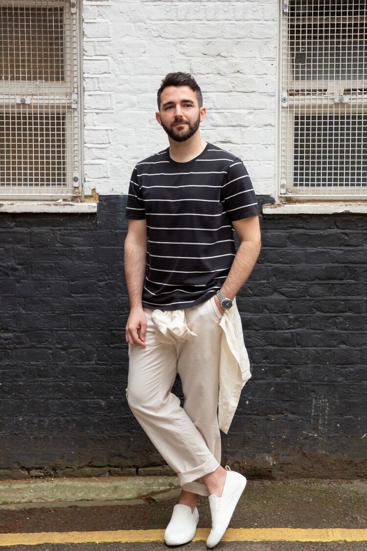 man wearing UNIQLO striped T-shirt and linen trousers