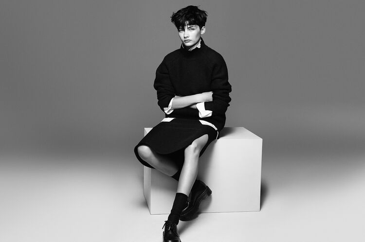 Woman wearing a +J premium lambswool sweater