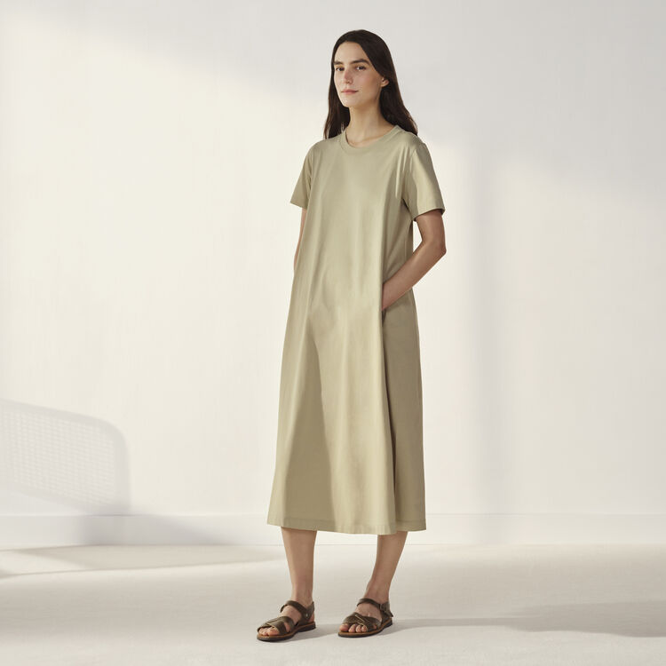 woman wearing Uniqlo U dress