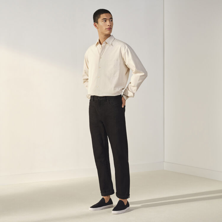 man wearing Uniqlo U jeans