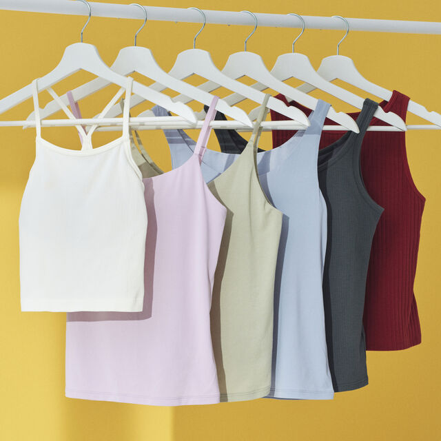 six UNIQLO bra tops on hangers