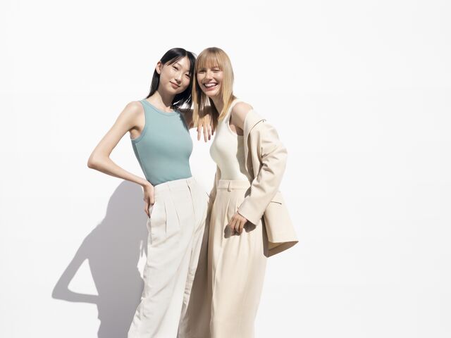models wearing UNIQLO viral bra top and pleated wide leg trousers