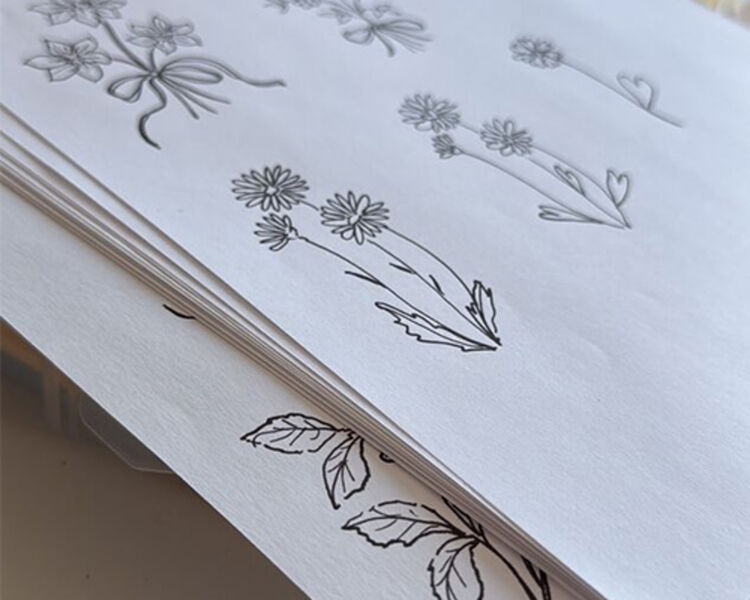 floral embroidery designs by Cressida Jamieson on paper