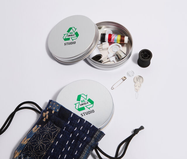 sewing kit with RE.UNIQLO STUDIO branding
