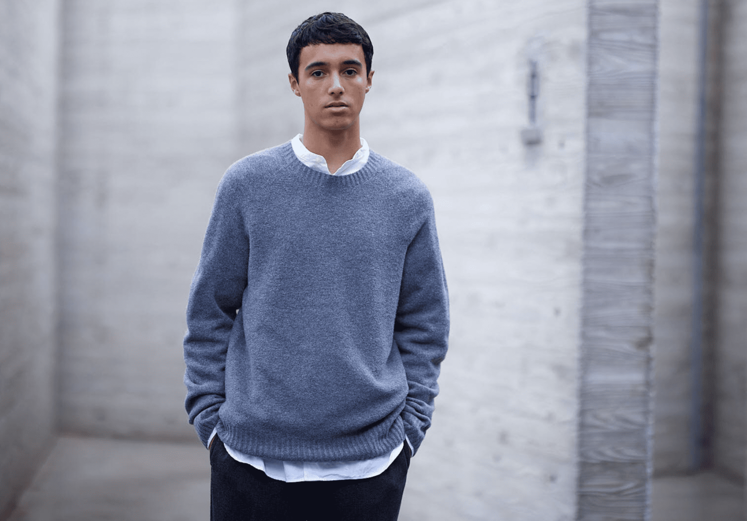 man wearing UNIQLO 3D Knit blue jumper