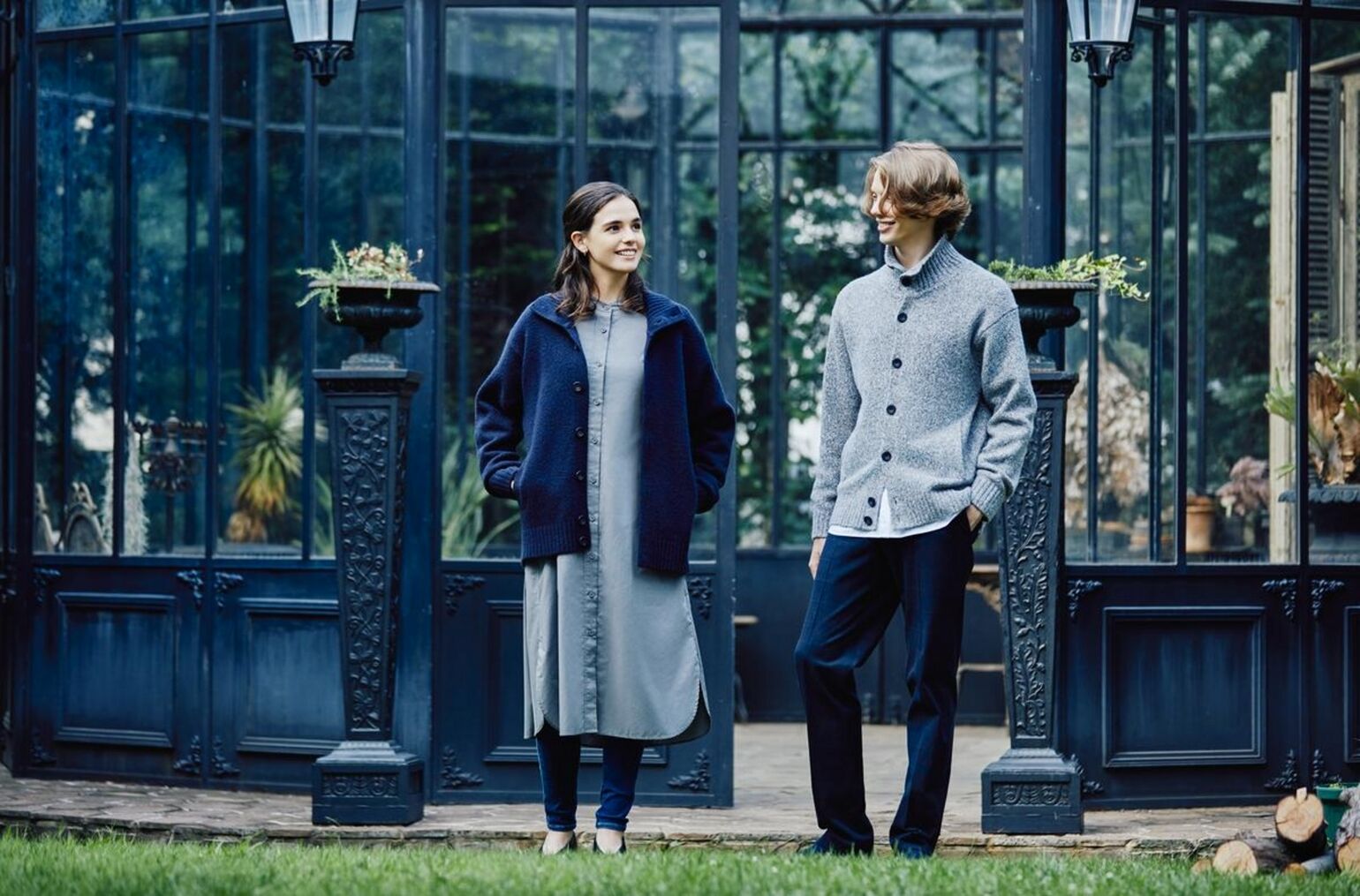 woman and man wearing UNIQLO soufflé cardigans