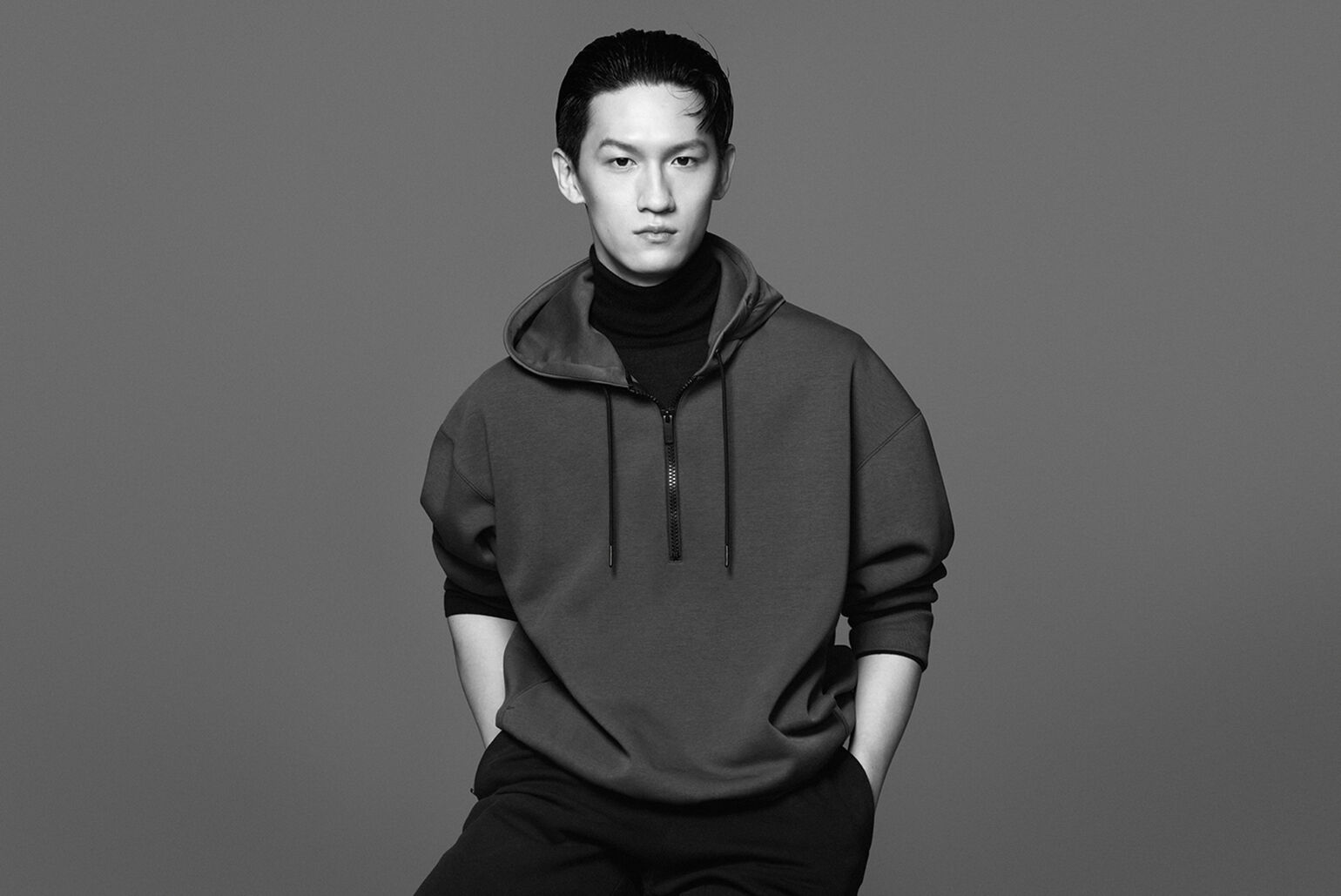 Man wearing a +J DRY sweat Hoodie