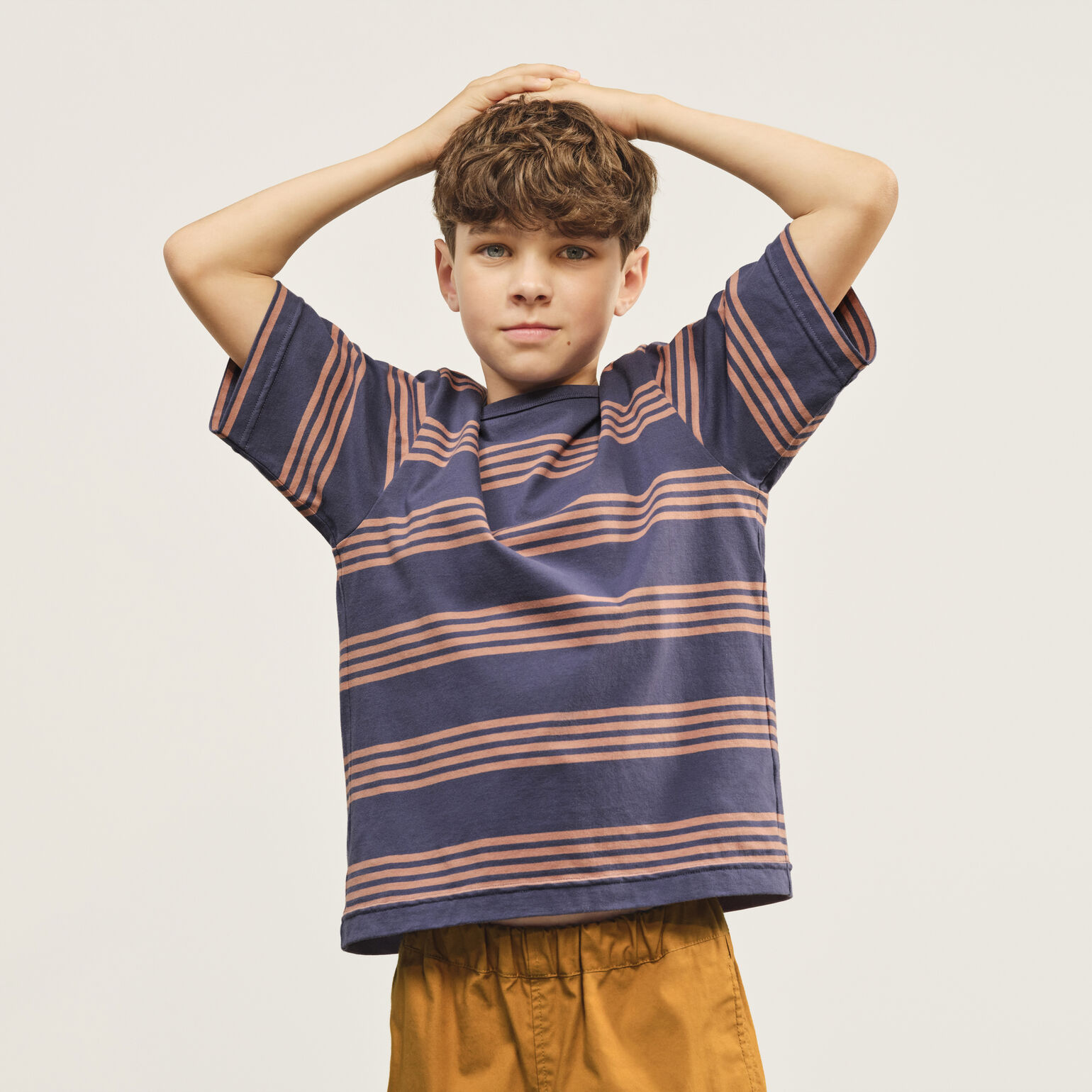 kid wearing Uniqlo U T-shirt