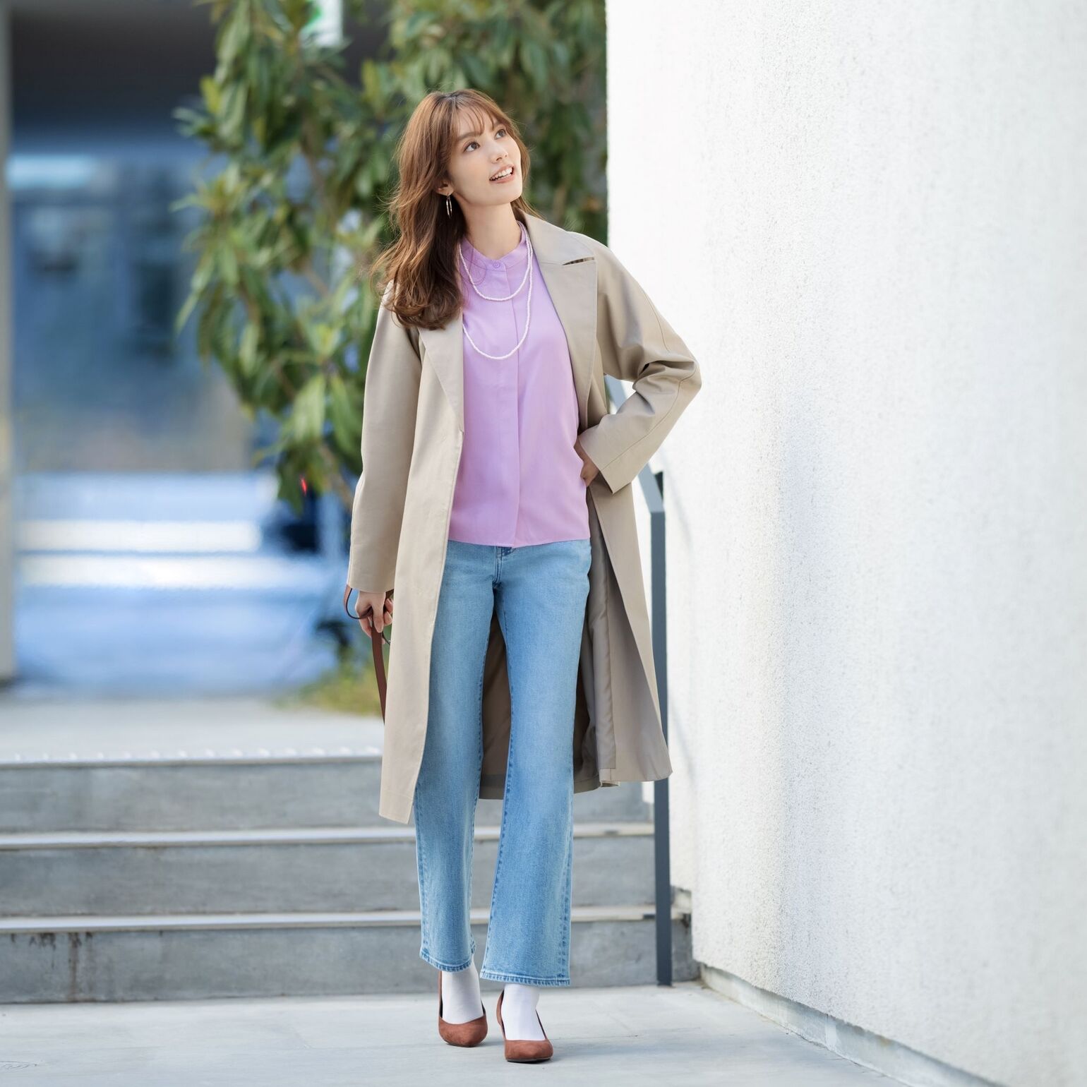 woman wearing UNIQLO jeans, coat and top
