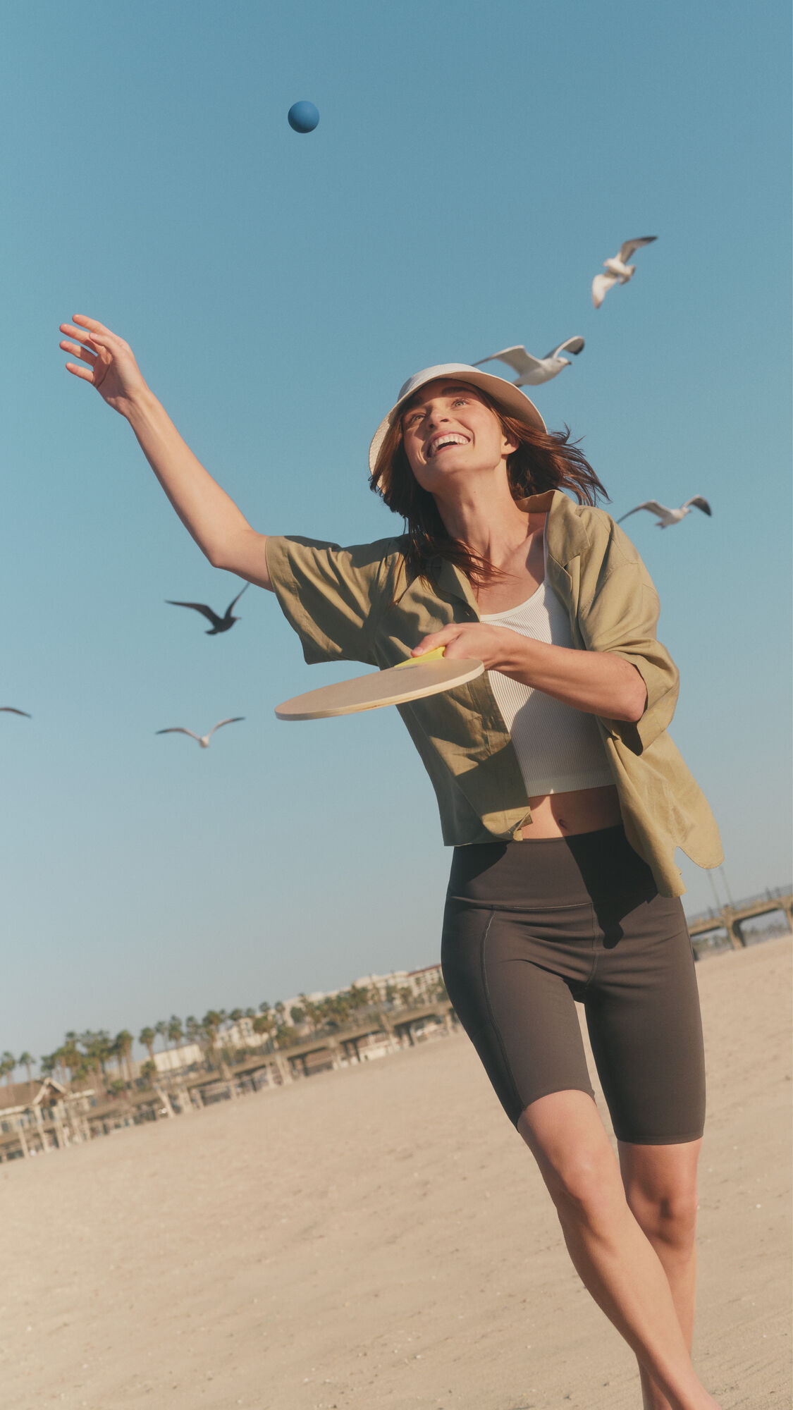 model wearing short sleeved shirt and shorts