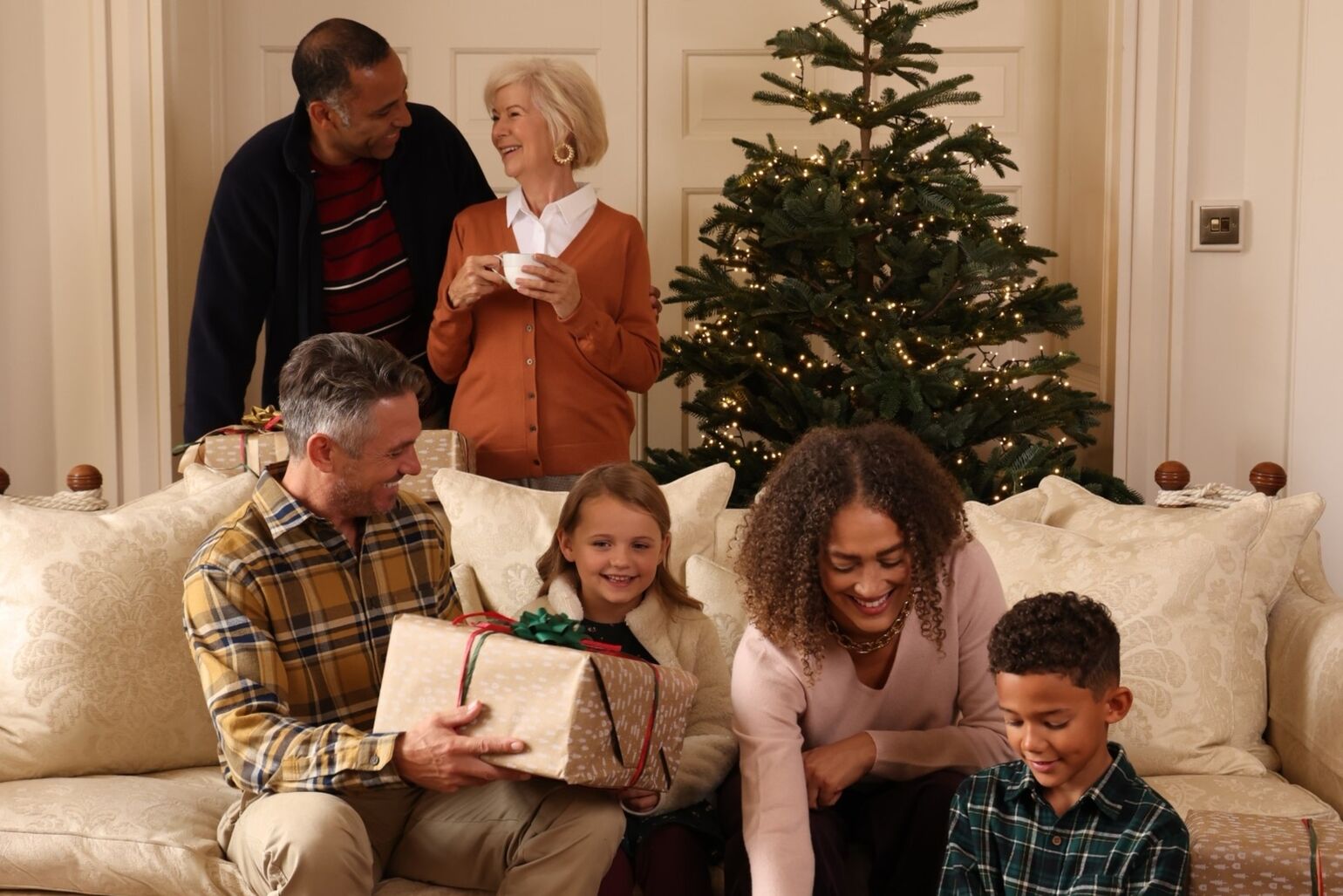 a family wearing UNIQLO cosy clothing