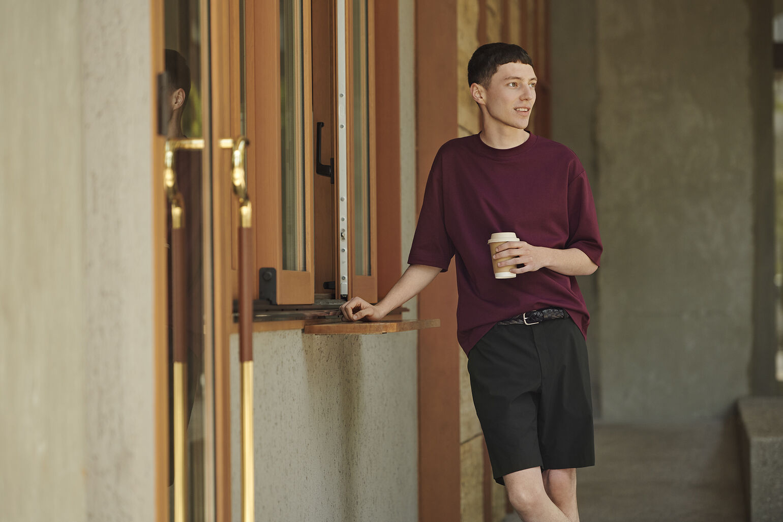 model wearing the Uniqlo U AIRism Cotton Crew Neck Oversized Half Sleeve T-Shirt