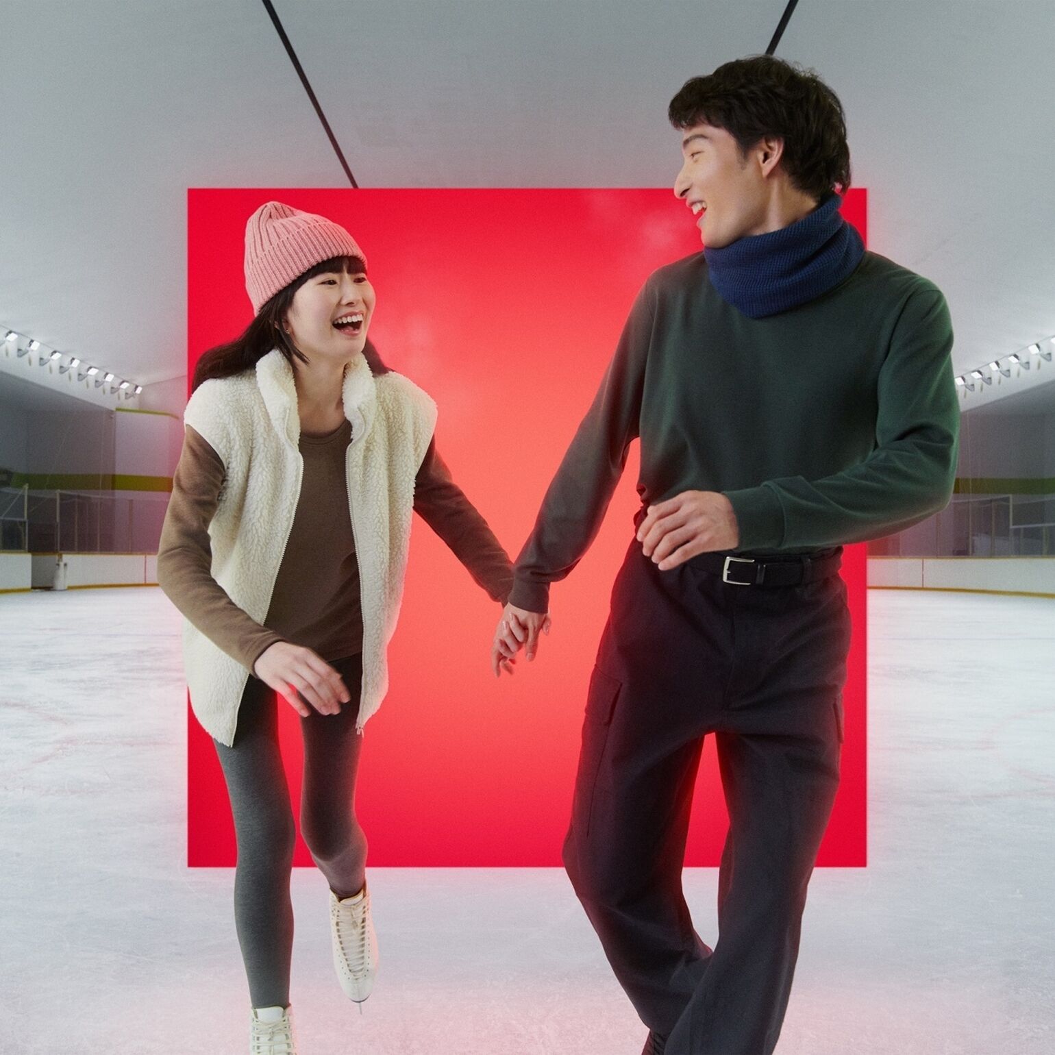 Man and women wearing UNIQLO HEATTECH