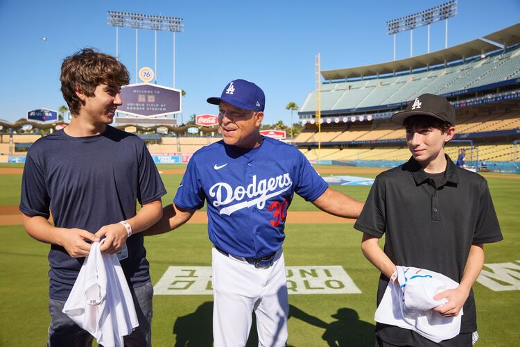 Participants in “The Heart of LifeWear” interacting with Manager Dave Roberts