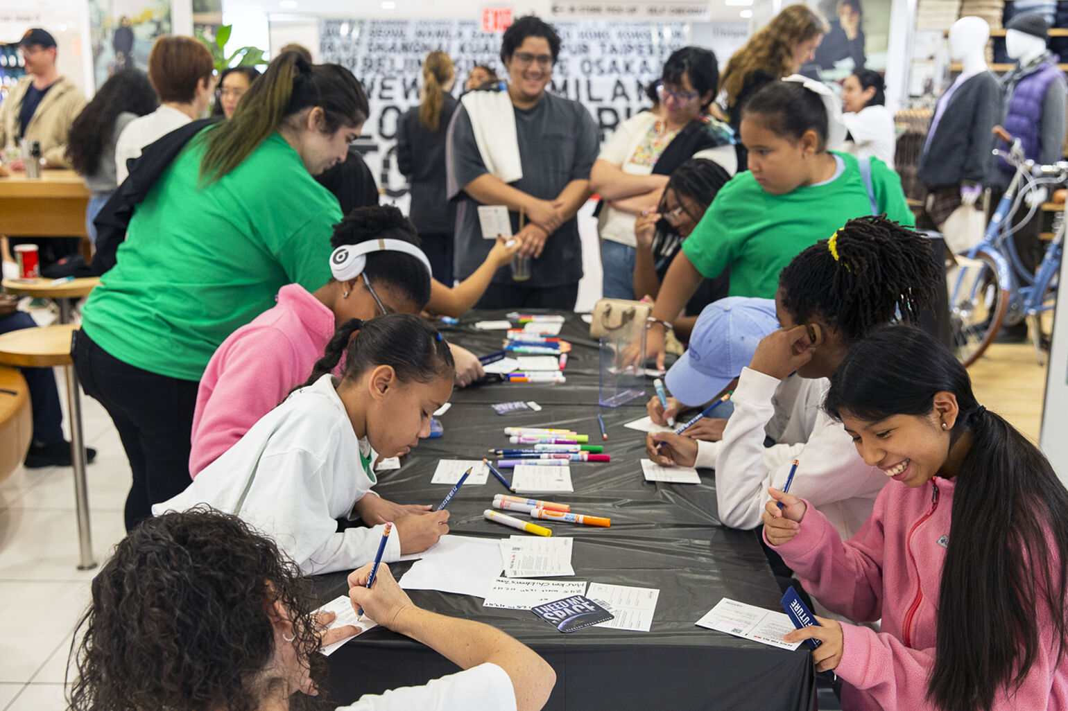 Volunteers and young children at the Peace For All and Club for the Future collaboration event